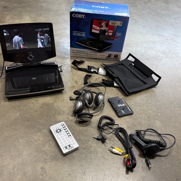 Coby Black Portable DVD/CD Player with Accessories - Picture 1 of 11